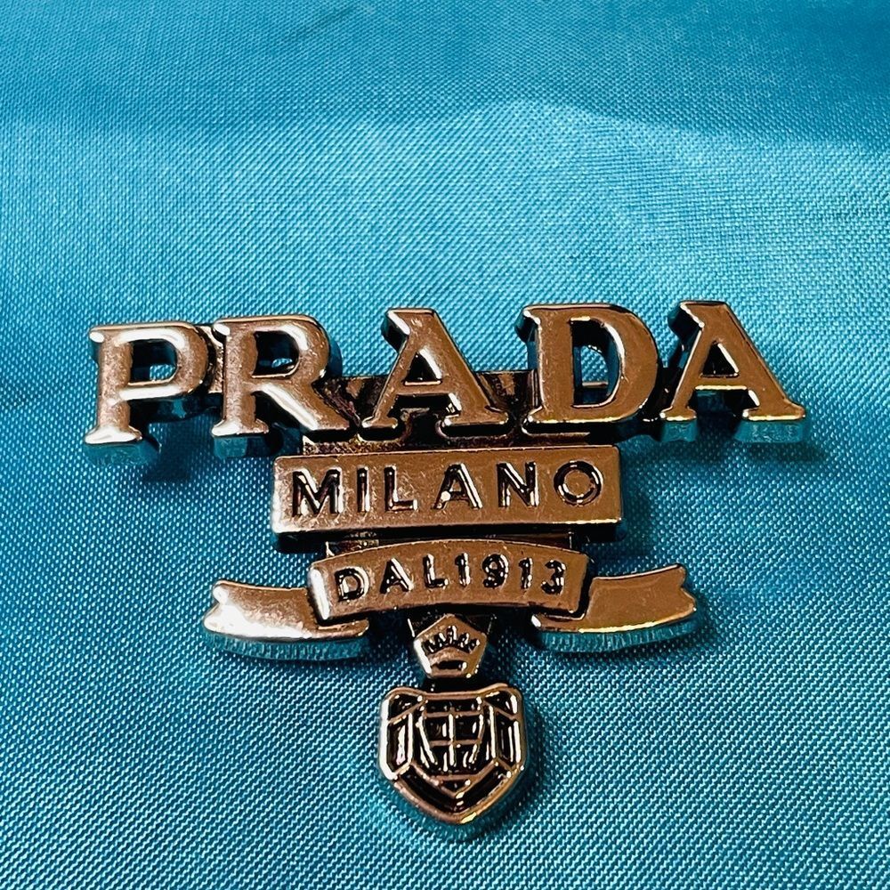 Prada Brooch Silver Logo Emblem Pin NIB